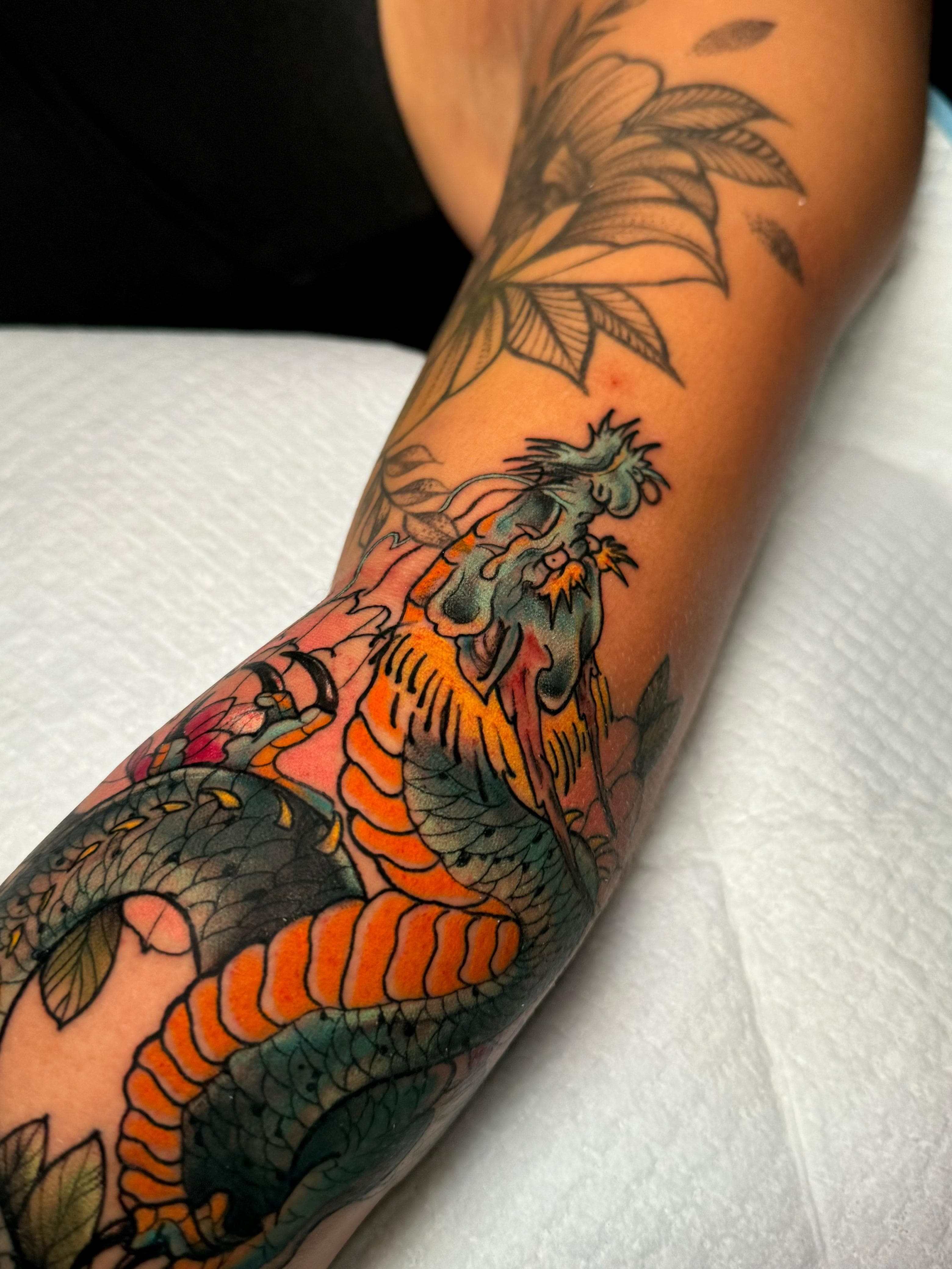 Tattoo artist at work